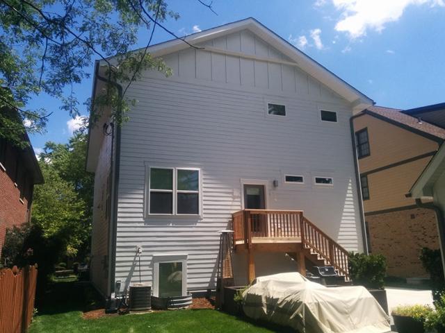 Beneath the rot-resistant fiber cement siding, a multilayered system of coated OSB sheathing, carefully layered and taped house wrap, and flexible tape flashing around doors, windows, and openings provides comprehensive protection against air and water leaks.