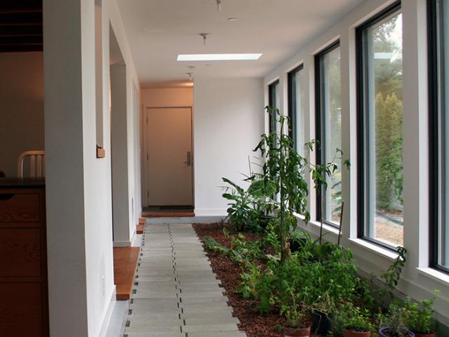 The majority of the home's triple-pane windows face south to capture passive solar energy as part of a natural comfort system.