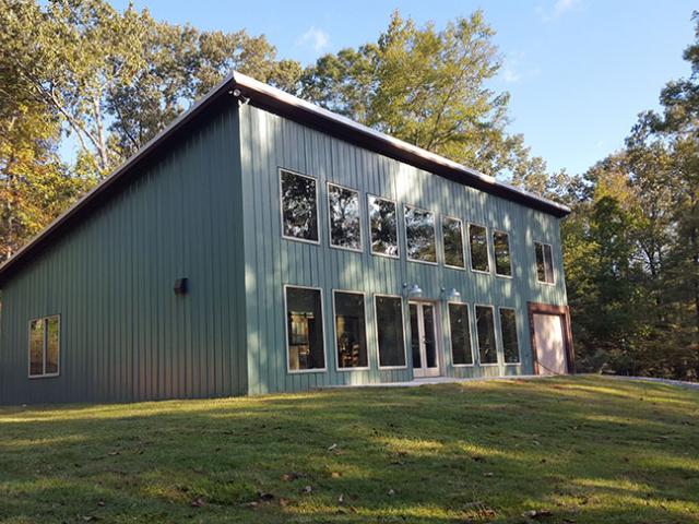 The home's large picture windows are double-paned with an insulating argon gas fill between the panes and low-emissivity coatings that block radiant heat to help keep the heat inside in cold weather and outside in hot weather.