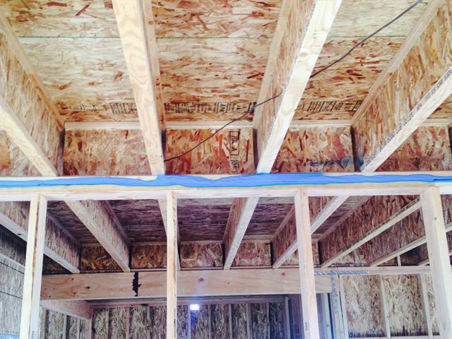 Garbett Homes used spray foam insulation in all of the rim joists, attic heels, over top plates, and as needed in other crucial areas as part of their plan for comprehensive draft protection.