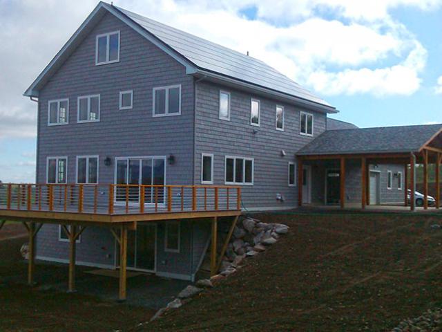 The builder took advantage of a sloping lot to include a conditioned daylight basement that permits more living space on a smaller footprint.