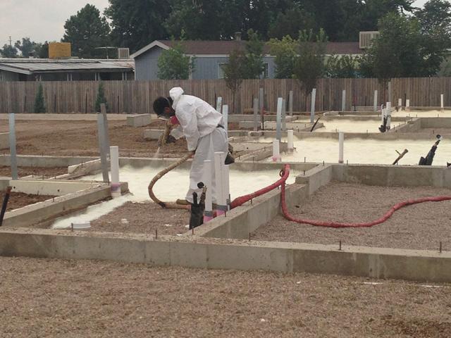 The builder's crews spray foamed under the slab to provide a vapor barrier and a comprehensive R-10 thermal blanket.