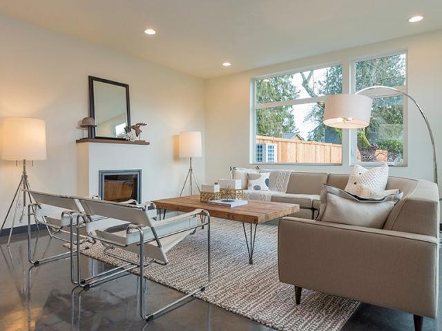 The home’s open floor plan makes good use of the highly efficient triple-paned windows, which flood the home with natural light.