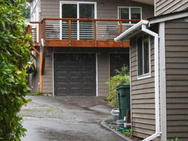 The south-facing shed roof of this home is optimally angled for solar energy production should the homeowner decide to install solar panels in the future; however, even without solar panels, the home cut utility costs $454 compared to a similar-sized home built to the 2012 energy code. The home is expected to have utility bills of about $824 per year or $69 per month.