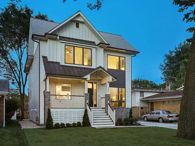 The home was designed on a 2-foot grid, starting with its 32-by-48-foot footprint, and incorporated several advanced framing concepts including two-stud corners on exterior walls, ladder blocking on interior partitions, right-sized and insulated headers, and window sizing aligned with the wall studs to minimize extra framing. These steps reduced the amount of wood in the walls, leaving more space for insulation.