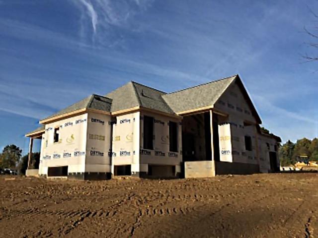 The home's finished basement is protected from water intrusion by the ICF foundation walls and water-resistant barrier, as well as good site grading that creates a positive slope away from the house.