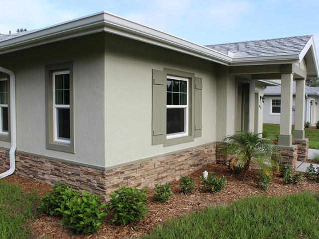 Climate-specific features include bug- and moisture-resistant concrete block construction and borate-treated interior framing; a hurricane-resistant hip roof design that resists uplift in high winds; an unvented attic that avoids the entry of wind-driven rain through open soffit vents, and spray foam on the underside of the roof deck that helps &amp;quot;glue&amp;quot; together the roof. ENERGY STAR reflective roof shingles and low-SHGC windows with low-emissivity coatings help to minimize solar heat gain.