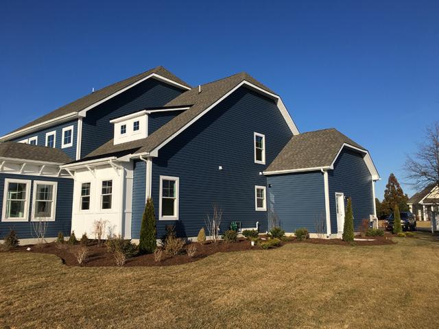 The home's double paned, vinyl-framed, argon-filled windows have low-emissivity coatings to limit heat transfer, an insulating value of U = 0.28 and a low solar heat gain coefficient (SHGC) of 0.19.