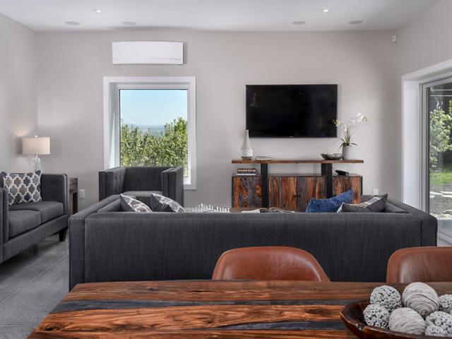 The home is heated and cooled by three very energy-efficient ductless minisplit heat pumps that are strategically located in the front bedroom, the master bedroom, and the living/dining area.