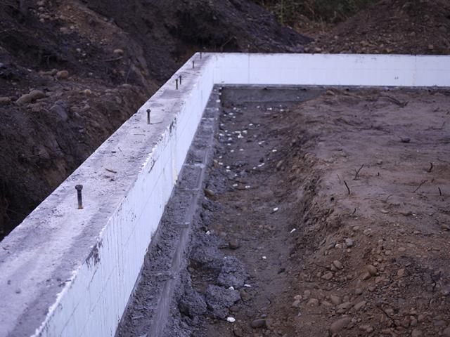 The foundation walls are ICF block providing two continuous layers (R-23) of insulation around the slab, which sits on an additional 4 inches (R-20) of low-VOC EPS foam.