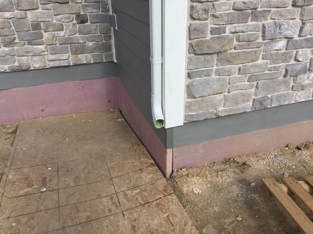 Rigid foam protects the exterior of the foundation.