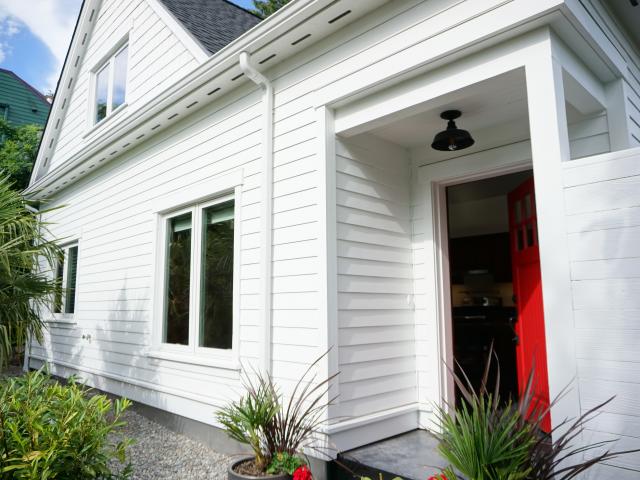 Durable fiber-cement siding and trim protects the exterior in the damp northwest climate.