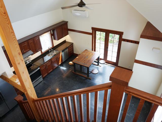 The sealed concrete floors provide thermal mass for passive heating that supplements the 800-square-foot home's single mini-split ductless heat pump.