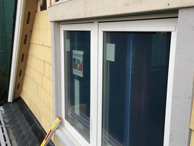 The double-pane windows have low-emissivity coatings and an argon gas fill between the panes to boost their insulating value to a U factor of 0.25.