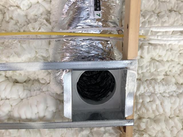 Seven inches (R-25) of open-cell spray foam blankets the underside of the unvented roof, providing a temperate place for the HVAC ducts.