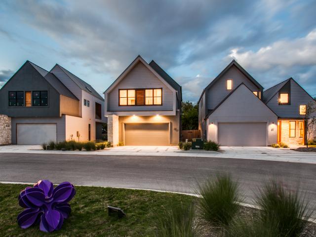 The 12-home community is built around a lower central park that acts as a filtering and retention pond for storm water runoff.  Smart irrigation minimizes water usage.