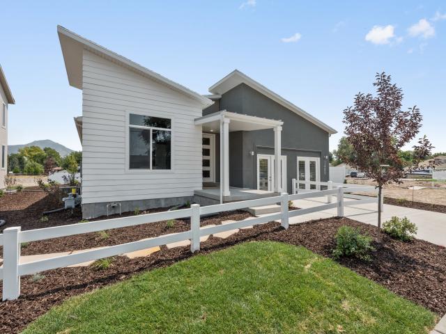 Heating and cooling bills should run about $80 per month for the energy-efficient home, which features modern roof lines, a signature trait for this production builder.