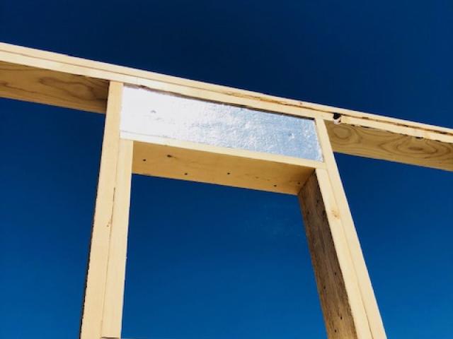 Insulated headers over windows are among the many advanced framing techniques incorporated in the 2-by-6, 24-inch on-center walls to reduce lumber usage and provide more space for insulation.