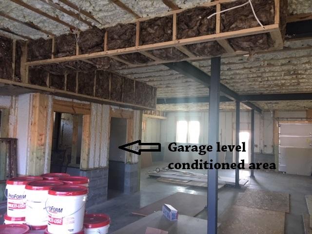 The lower-level walls are filled with 2 inches (R-13) of closed-cell foam and 10 inches (R-36) of open-cell foam. This combination is also used in the rim bands between floors. The second- and third-floor walls are filled with 5.5 inches (R-22) of blown fiberglass insulation.