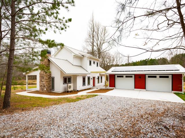 With the 8.2-kW photovoltaic system on the roof, this home performs better than net zero, achieving a HERS score of -13, which means it produces more power than the home will use so there may be power left over to run an electric car or sell back to the grid.