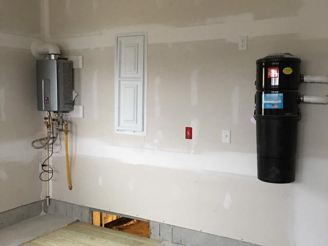 An efficient tankless water heater provides endless hot water for the home.