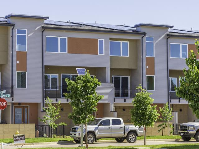 With 7-kW of photovoltaic panels on each roof, these townhomes have achieved a true net zero HERS score of -1 with annual utility costs of only $60 per year.