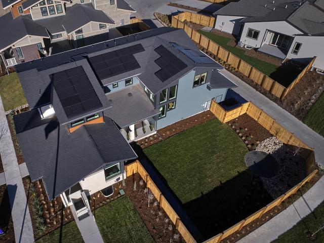 A 9.92-kW PV system and a 7-kW battery will help bring this efficient home's electric bill to below $17 a month.