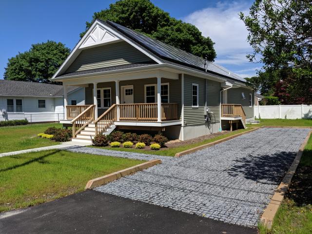 This affordable home combines energy-efficient construction and roof-mounted PV panels for a home so efficient, its homeowners should have utility bills of about $5 per month.