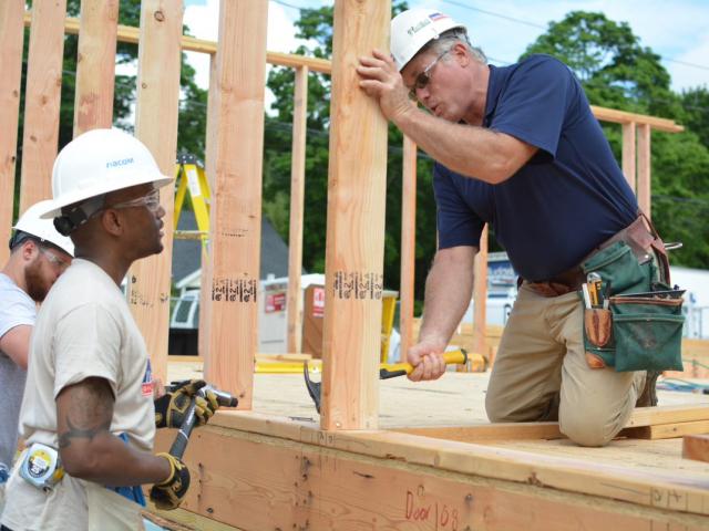 Rick Wertheim, United Way of Long Island's vice-president for green programs, instructs workers in proper construction techniques as part of the agency's training programs.