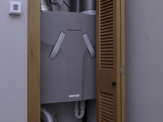 The energy recovery ventilator operates continuously to provide clean fresh air throughout the home.