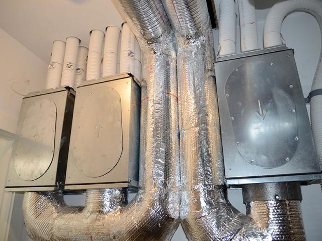 An energy recovery ventilator fresh air system provides filtered fresh air to every room in the house.