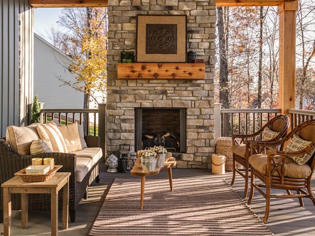 The outdoor fireplace provides the ambience of a wood fire while keeping the combustion byproducts outside of this EPA Indoor airPLUS certified home.