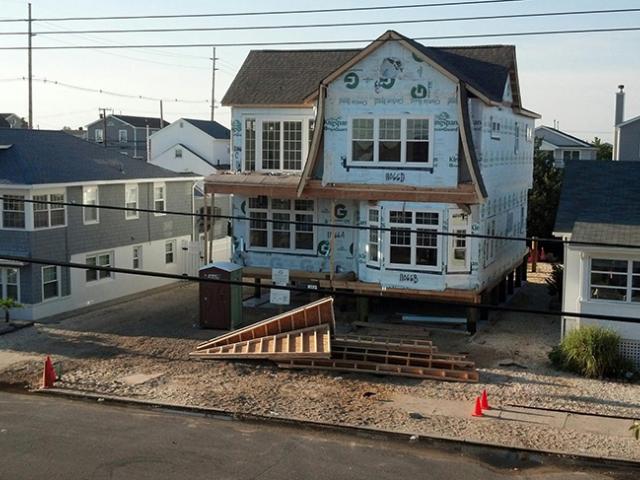 The pier foundation that lifts this home above flood waters is visible in this photo taken before the skirt walls were added.