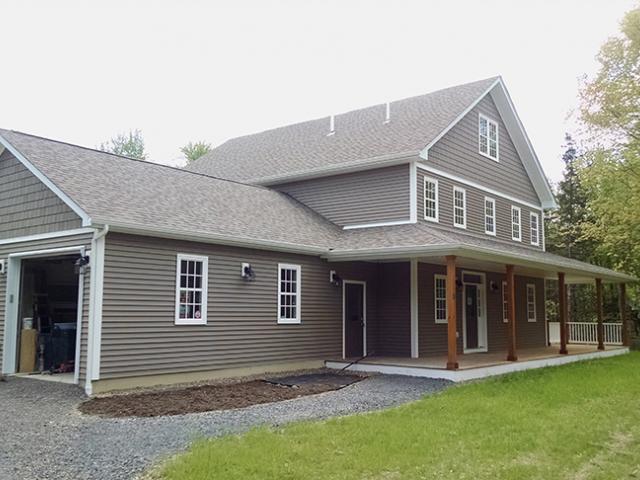 The lack of pipes, flues, and vents coming out of this roof is a good thing. It means less holes where heat can leak out and water can leak in.