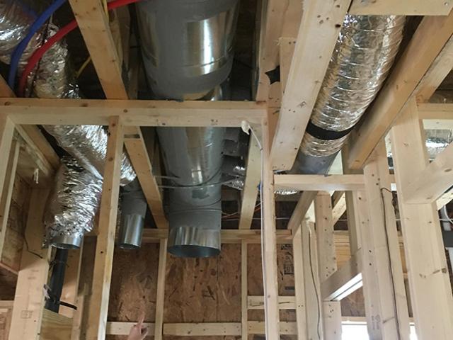 All of the ductwork for the efficient (8.5 HSPF, 15 SEER) heat pump is mastic sealed and installed in conditioned space.