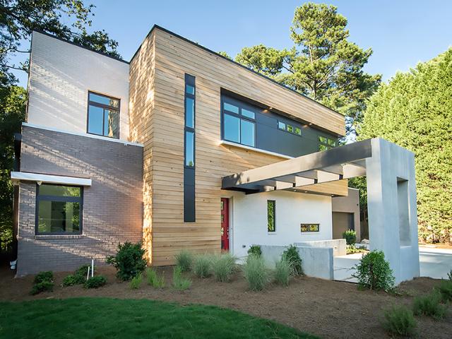 This efficient modern home is expected to save its owners more than $1,000 per year in energy costs compared to a home built to code.