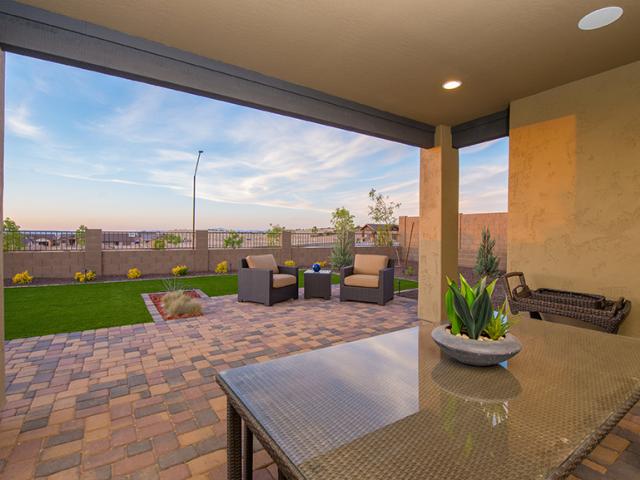 Xeriscaping, drip irrigation, and artificial turf minimize water use in this high-desert locale.