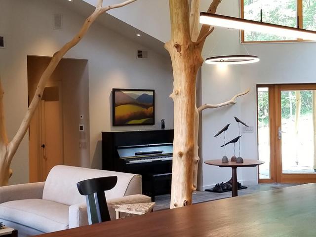 Triple-glazed, argon-filled, Passive House-certified windows fill the home with natural light.