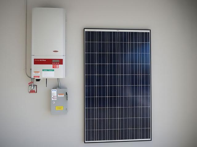 The home includes an 8.48-kW photoelectric system with inverter that provides more than enough solar energy to power the house.