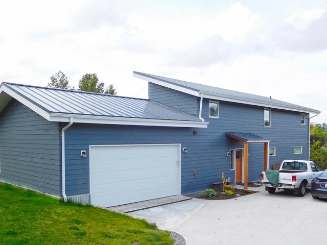 The home’s rectangular shape and simple gable roof decreases construction costs and provides more space for solar panels.