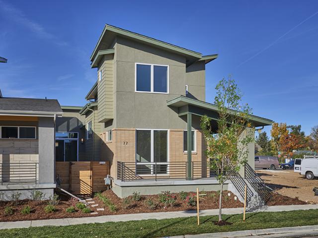 Durable materials like fiber cement and stone siding, concrete porches, and metal railing will stand up to the weather extremes of the Denver climate.