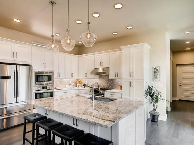 The kitchen is equipped with a resource-efficient ENERGY STAR refrigerator and dishwasher.