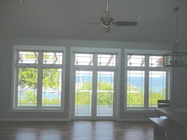 Ultra-efficient triple-pane windows minimize heat loss while maximizing views of the harbor from almost every room.