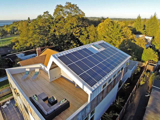 The 7.39 kW of solar electric panels are mounted to the standing seam metal roof.