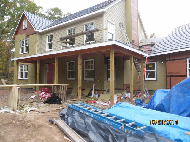 The home's high-performance wall system includes advanced framed walls, sheathing that has a laminated weather barrier and is taped at the seams, 2.75 inches of rigid mineral wool insulation, vertical strapping to ensure drainage, and fiber cement siding.