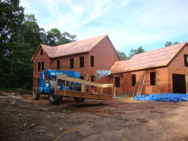 The comprehensive draft protection system includes sheathing laminated with a weather barrier and taped at all seams.