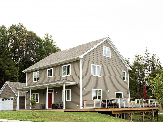 The highly efficient home stacks four floors on a small footprint, including a daylight basement.