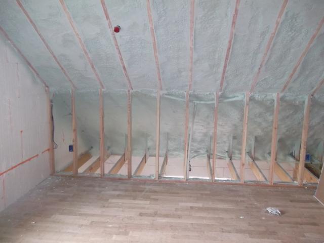 The sealed attic is insulated on the underside of the roof deck with 10 inches of openâ€cell spray foam plus 2.7 inches of closedâ€cell spray foam insulation to completely air seal the attic while providing an R-63 insulation value.