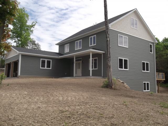 The four-story home has a simple, compact, energy-efficient, and cost-effective design that should save its homeowners close to $4,000 annually on energy bills compared to a home built to the 2009 International Energy Conservation Code.