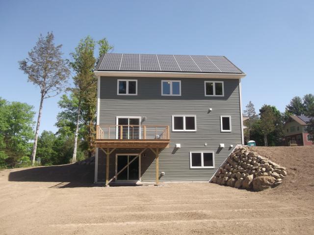 The zero energy home has an 11.76-kW solar electric system meeting all of the home's electricity needs and contributing to a Home Energy Rating System (HERS) score of -3. In other words, this home is forecast to produce more energy than it consumes.